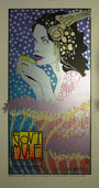 Chuck Sperrys artistic poster features a dark-haired woman holding a cup against a backdrop of red, white, and blue star patterns, with golden elements in her hair. The text at the bottom reads Govt Mule and Warfield 2012 in smaller print.