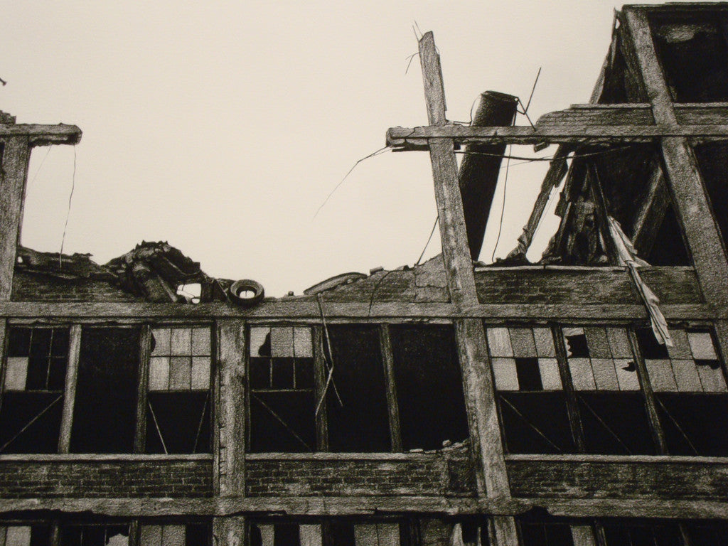 Stephanie Buers art style is echoed in a black and white image of a dilapidated building with shattered windows and crumbling structures. The top floor reveals debris and semi-collapsed beams, stark against a pale sky, capturing the haunting aftermath of a collapse.
