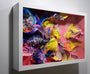 Crystal Wagners framed 3D paper sculpture showcases intricate shapes in yellow, blue, pink, and purple on a pink background. The cut paper elements resemble abstract feathers or petals, capturing the vibrant spirit of Terrarium IV.