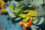 Crystal Wagners vibrant abstract installation, similar to Terrarium VI, showcases swirling green, yellow, and orange cut paper ribbons with blue, red, and green accents against a teal backdrop for a dynamic scene.