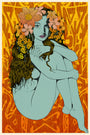 Ariadne is depicted nude with light blue skin, knees up, and long brown hair adorned with orange flowers. She sits against a vibrant mix of orange and yellow abstract patterns, reflecting Chuck Sperrys signature dynamic style.
